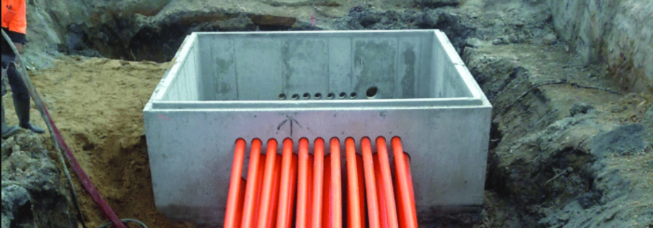 Concrete Electrical Cable Pit with orange conduit